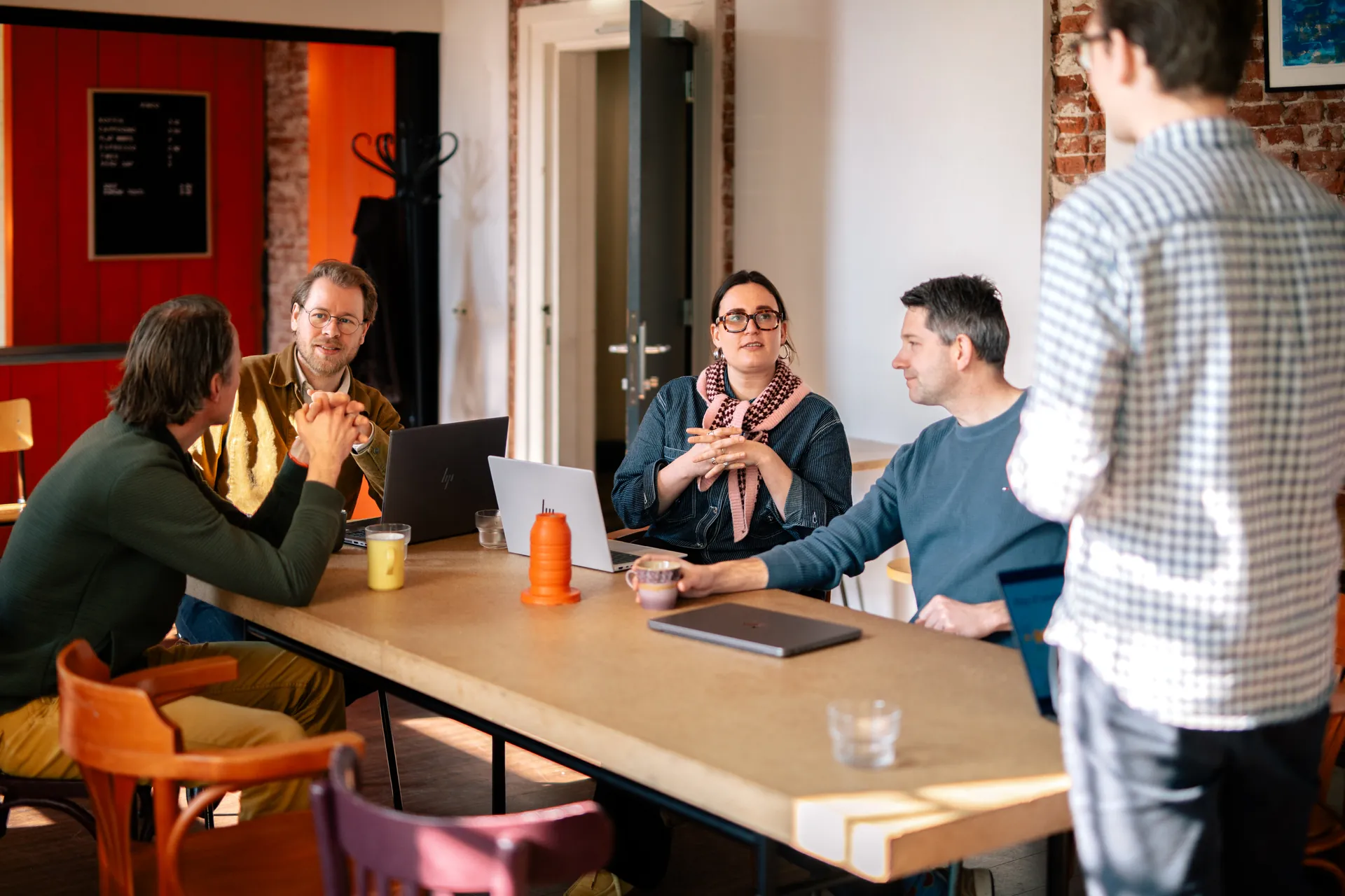 Mark with colleagues in discussion