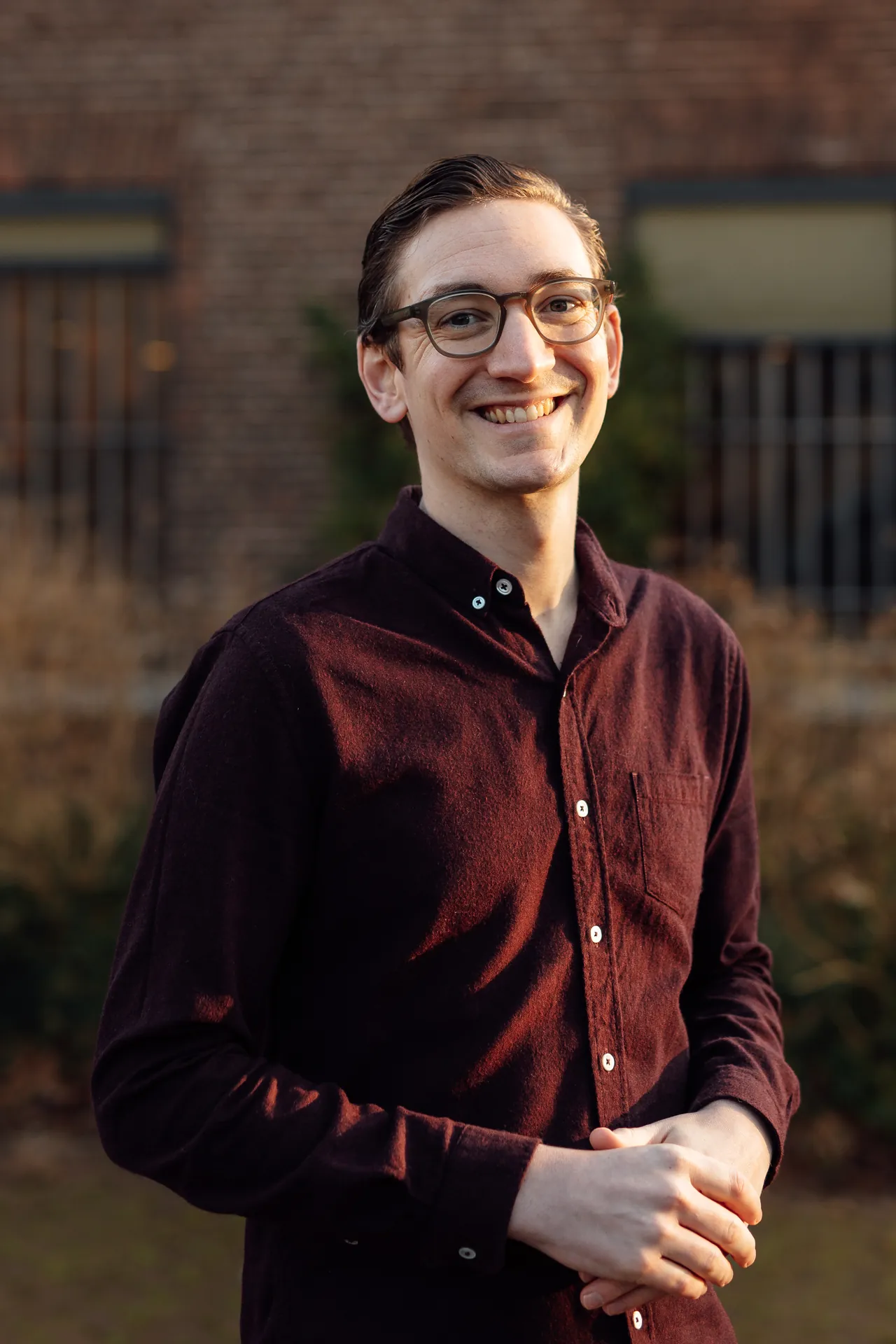 Mark Schep in front of a building